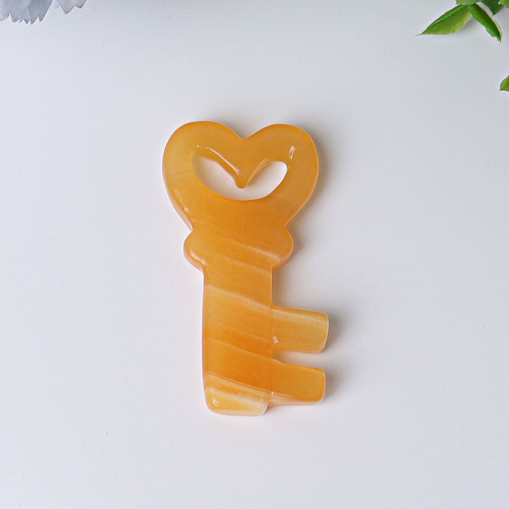 2.3" Orange Calcite Heart Key Crystal Carvings Crystal wholesale suppliers